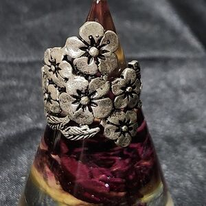 Size 7 3/4 Silver- tone Ring With A Beautiful Floral Motif.